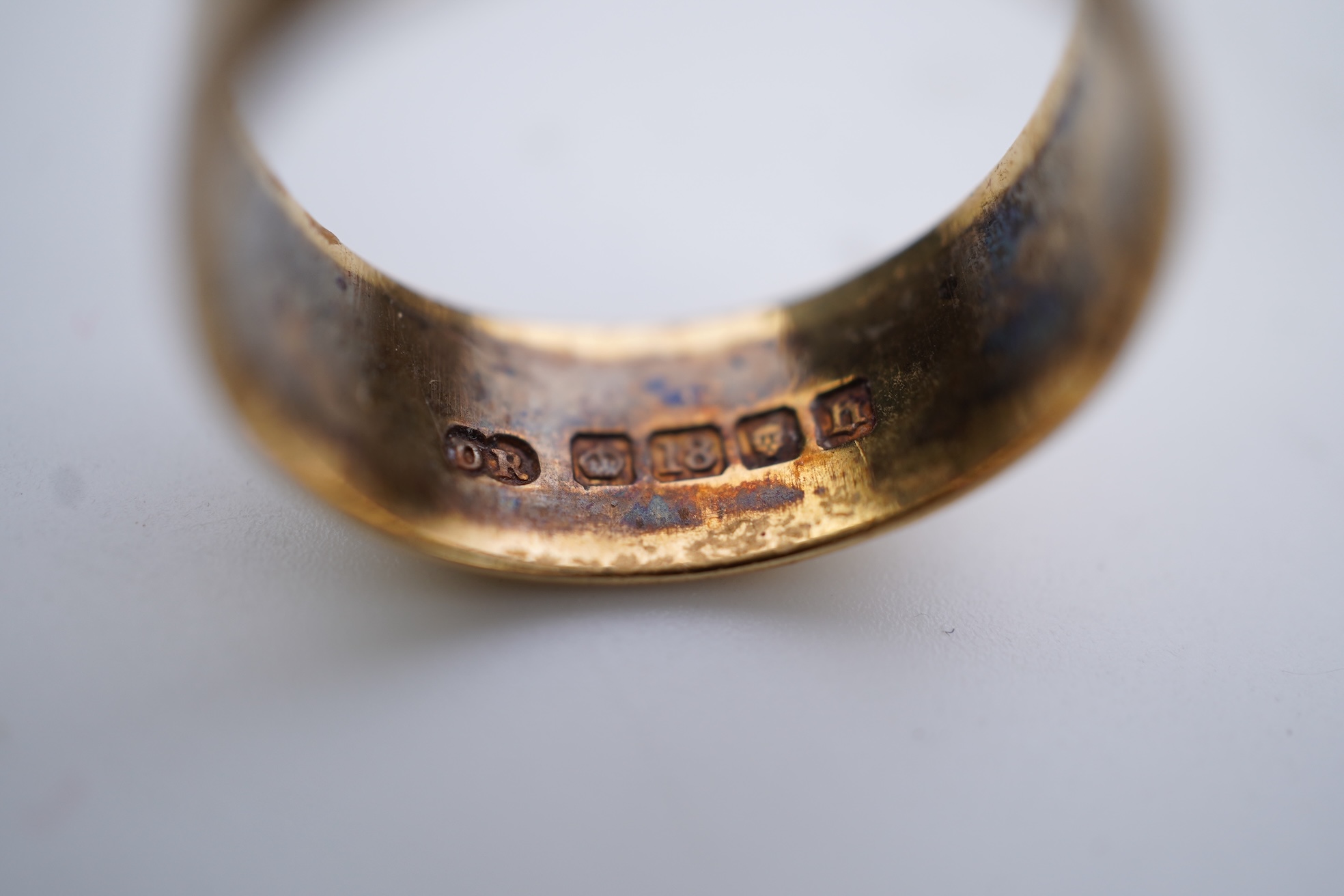 A collection of seven gold rings